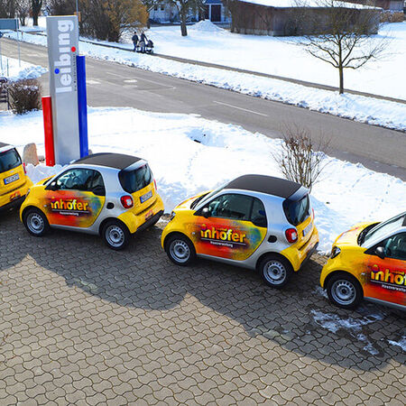 Fahrzeugbeschriftung — Smart-Flotte. Produziert von Leibing Werbetechnik.